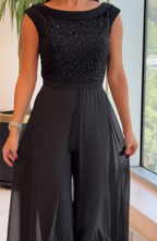 Crew neck textured panel tulle jumpsuit